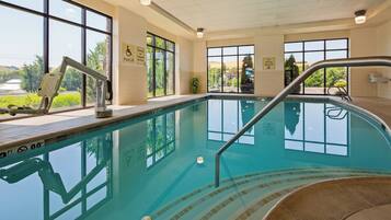 Enjoy a refreshing swim in our pool, featuring a pool lift for accessibility and clear signage.