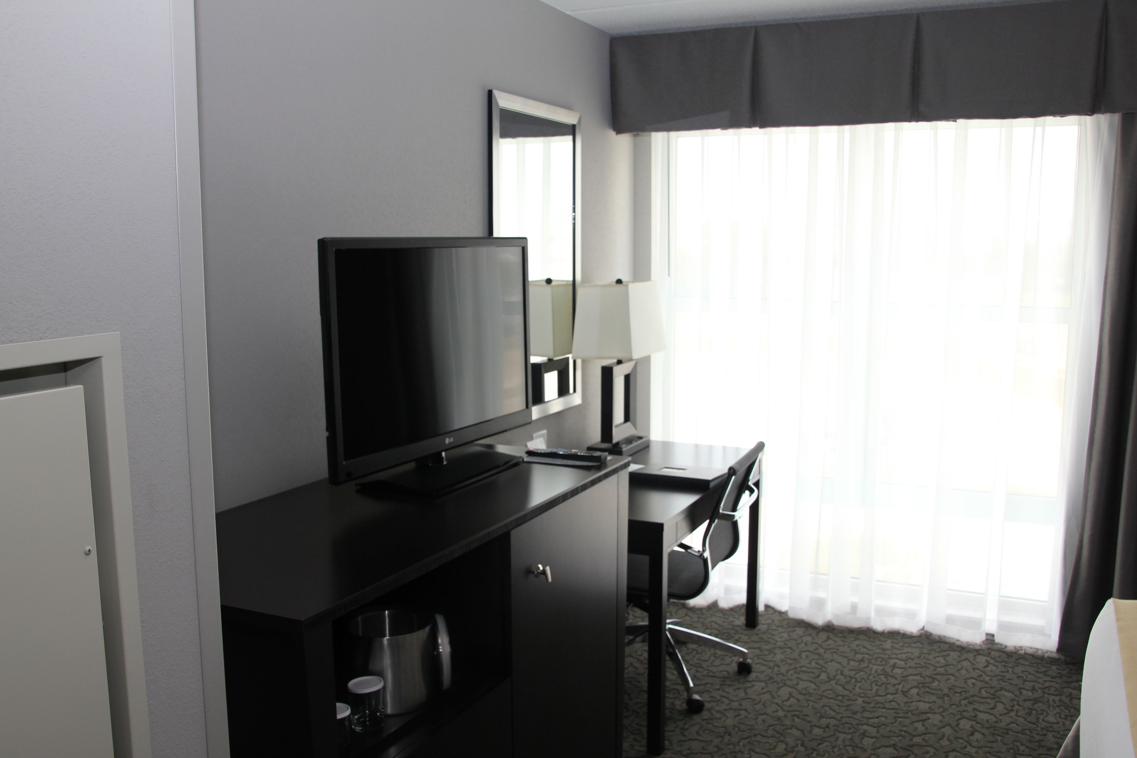 junior suite, 1 king bed (addl living area) | 1 bedroom, premium bedding, in-room safe, blackout curtains