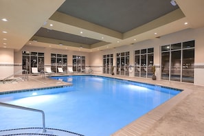 Indoor pool, open 6 AM to 11 PM, pool loungers