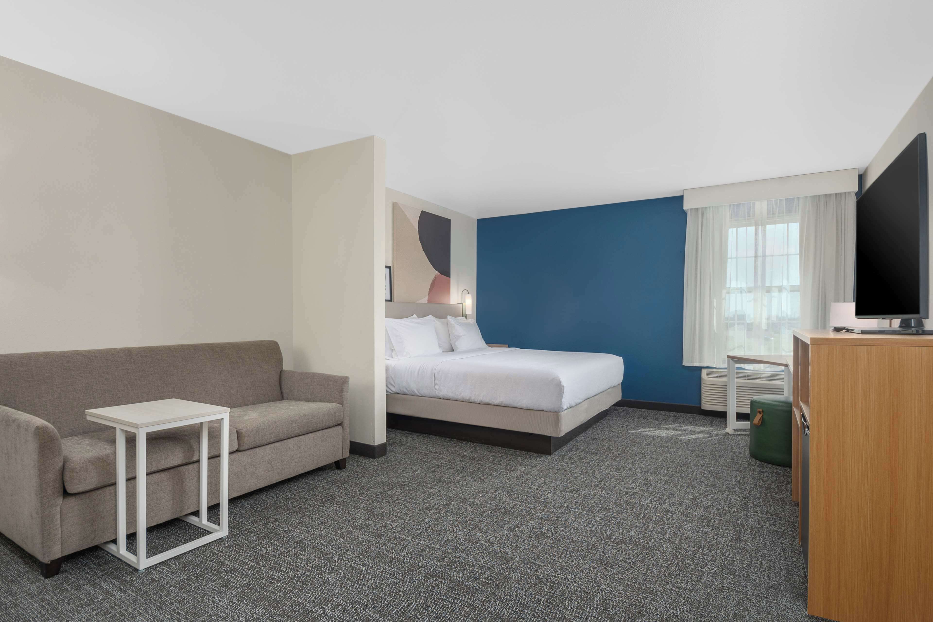 room, 1 king bed with sofa bed | living area | 42-inch lcd tv with cable channels, tv, ipod dock