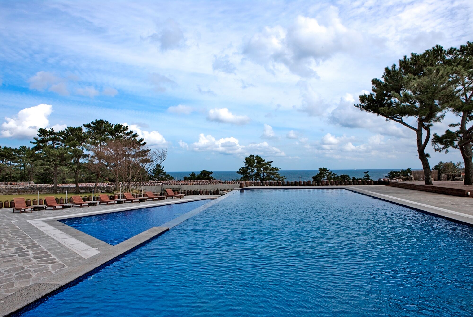 seasonal outdoor pool, open 9:00 am to 9:00 pm, pool loungers