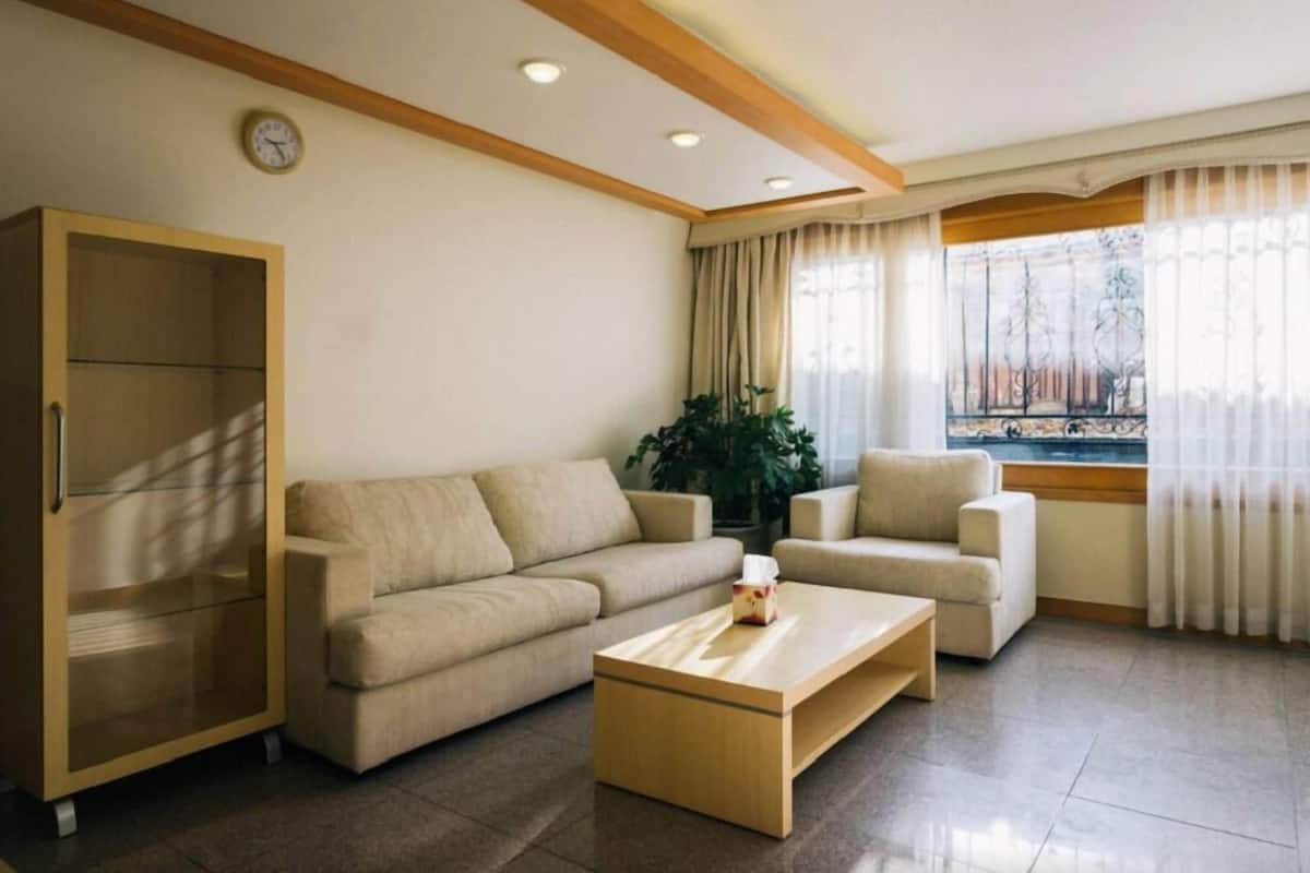 Family Apartment, 1 Bedroom, Non Smoking | Living area | TV