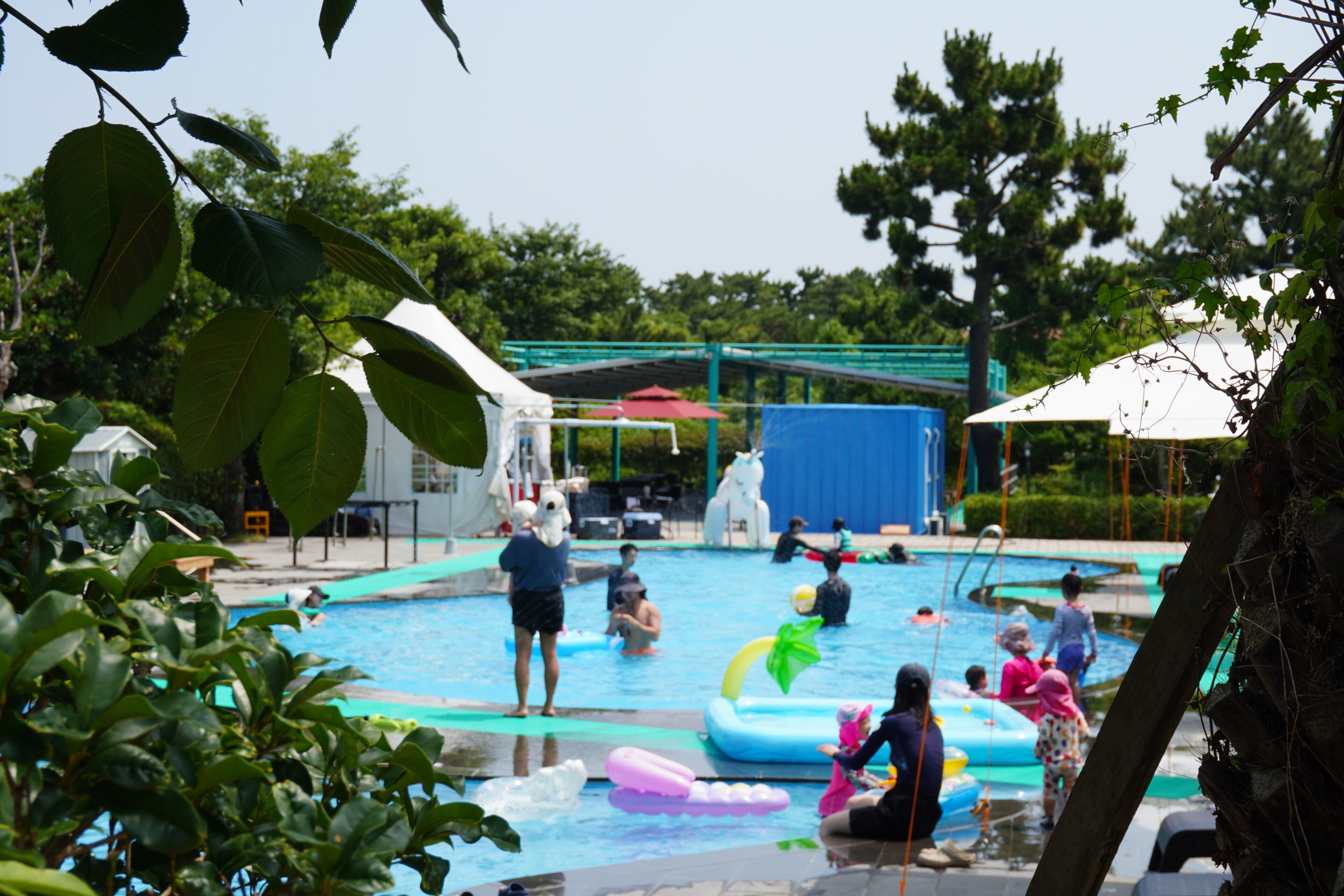 Seasonal outdoor pool, open 11:00 AM to 7:00 PM, pool umbrellas