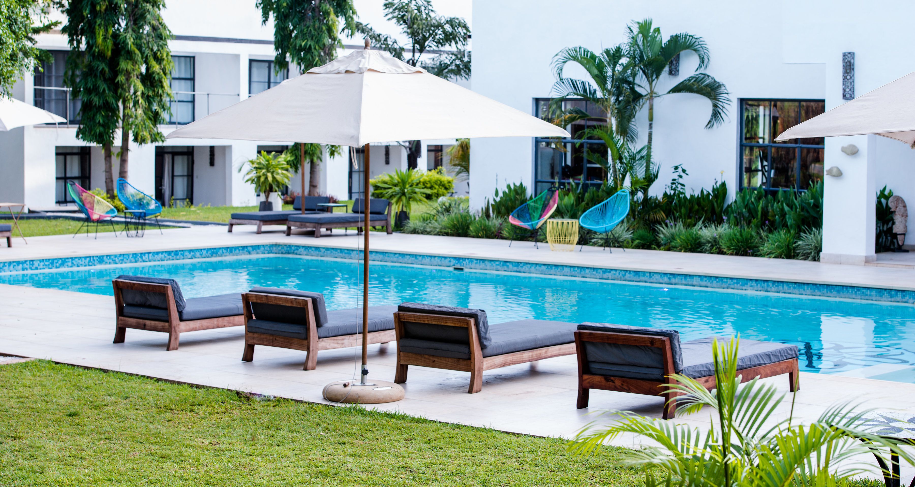 2 outdoor pools, pool umbrellas, pool loungers