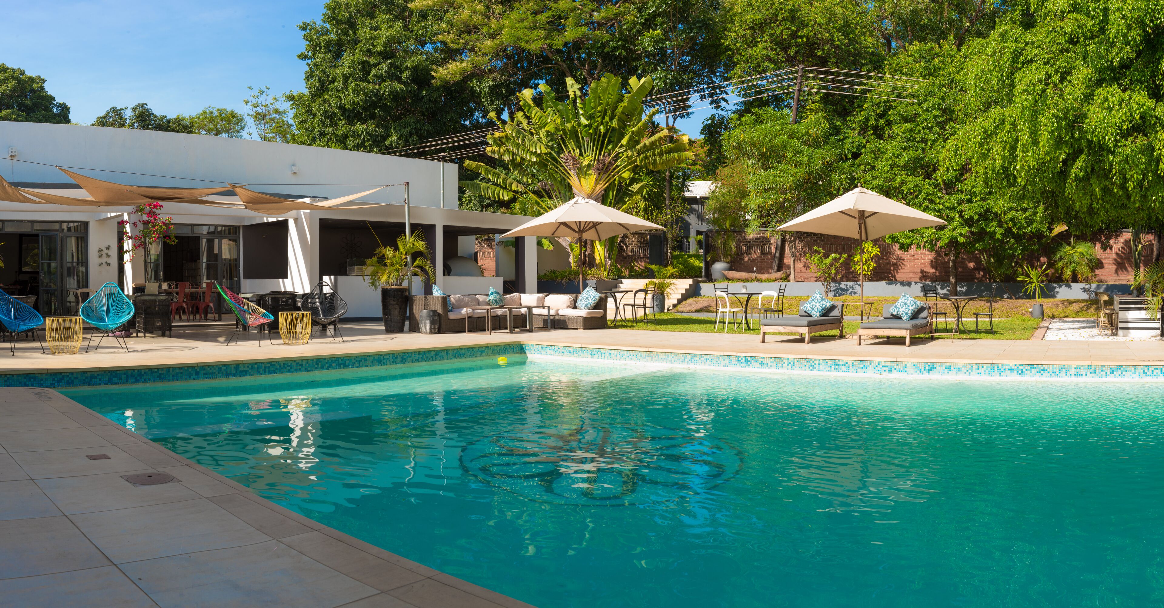 2 outdoor pools, pool umbrellas, pool loungers