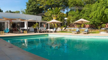 2 outdoor pools, pool umbrellas, pool loungers