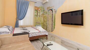 Premium bedding, pillow-top beds, iron/ironing board, free WiFi