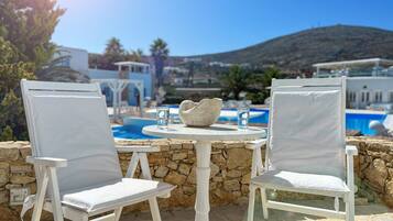 Bungalow, Patio, Pool View | In-room safe, individually decorated, soundproofing