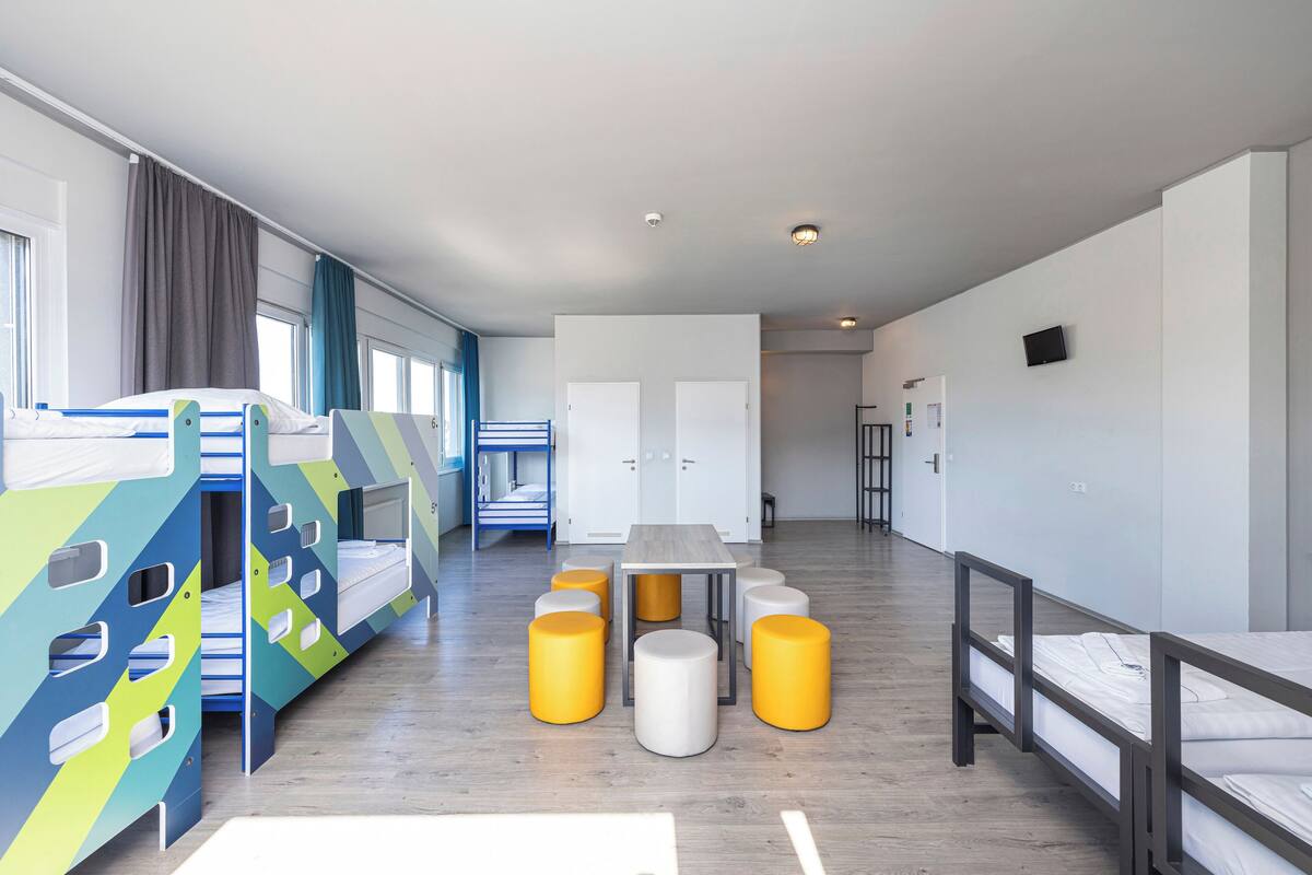 Bed in 8-Bed Dormitory | In-room safe, iron/ironing board (on request), WiFi (free), bed sheets