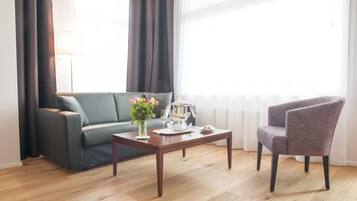 Chambre Deluxe, 1 lit double | Coin séjour