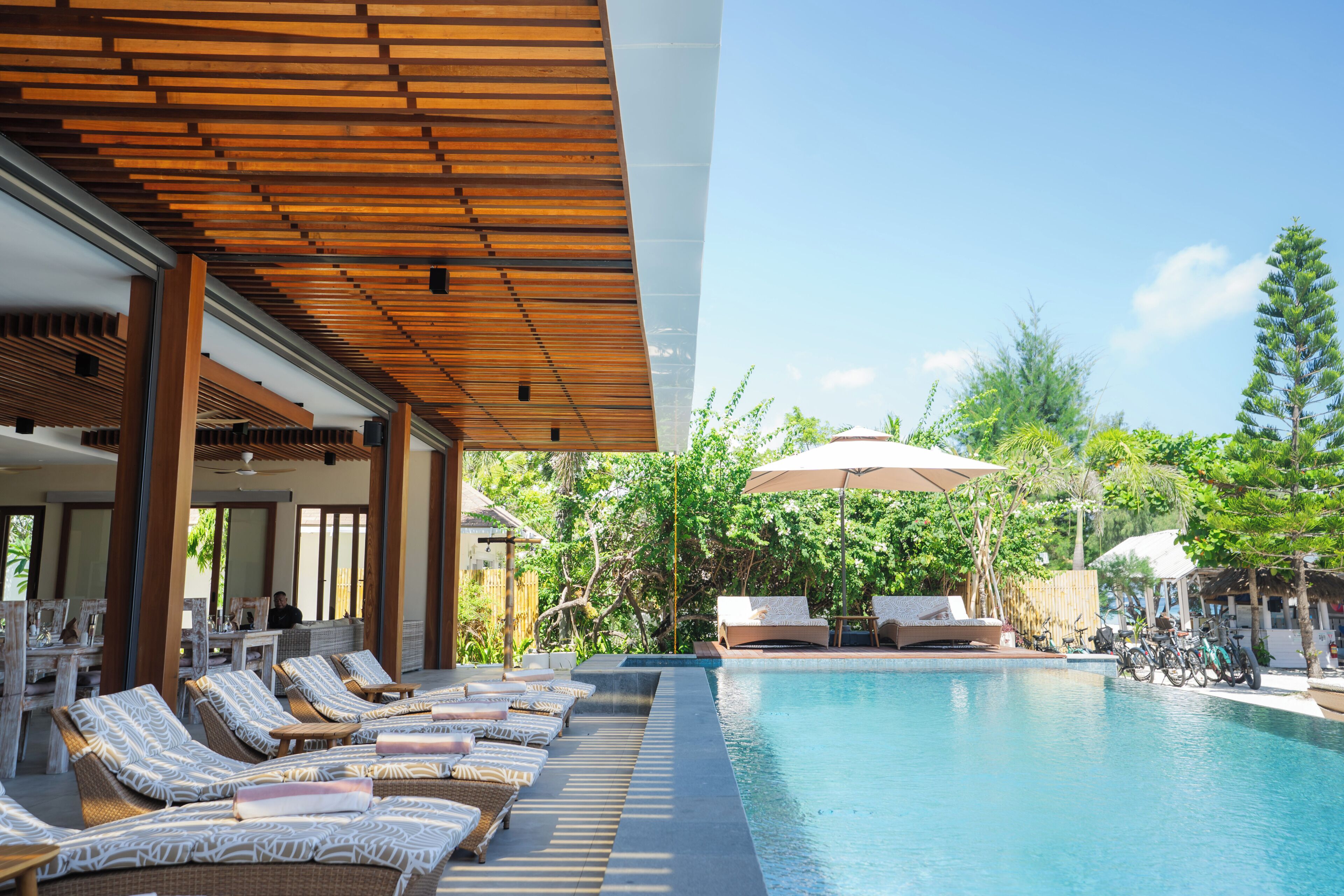 2 outdoor pools, open 8:00 AM to 6:00 PM, pool umbrellas, sun loungers