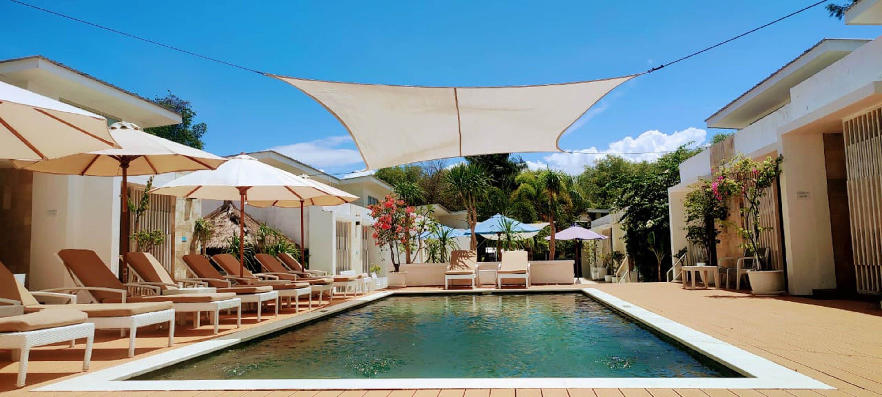 2 outdoor pools, open 8:00 am to 6:00 pm, pool umbrellas, pool loungers