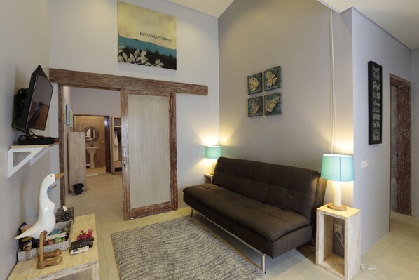 Suite familiar, 1 habitación | Zona de estar