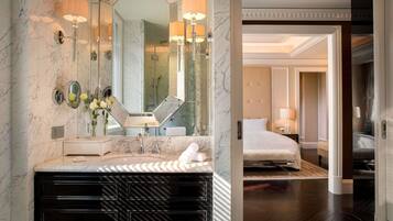 Premium bedding, down comforters, minibar (some free items)
