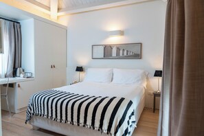 Down duvets, minibar, in-room safe, desk