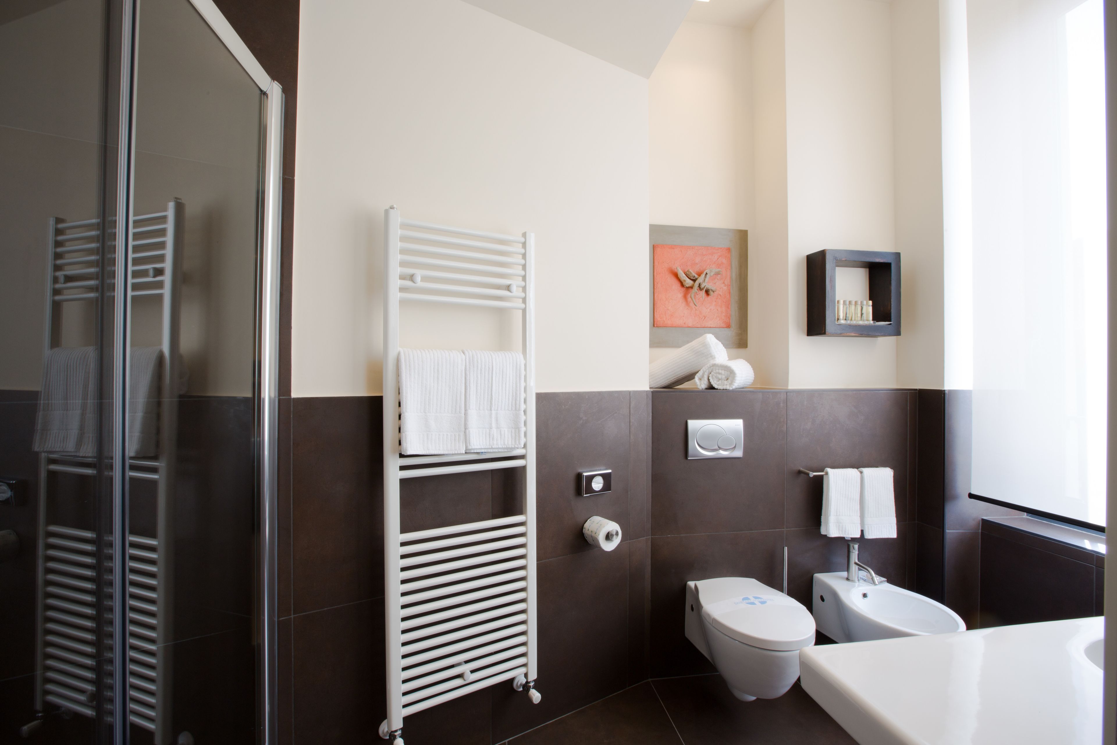deluxe double room | bathroom | shower, rainfall showerhead, designer toiletries, hair dryer