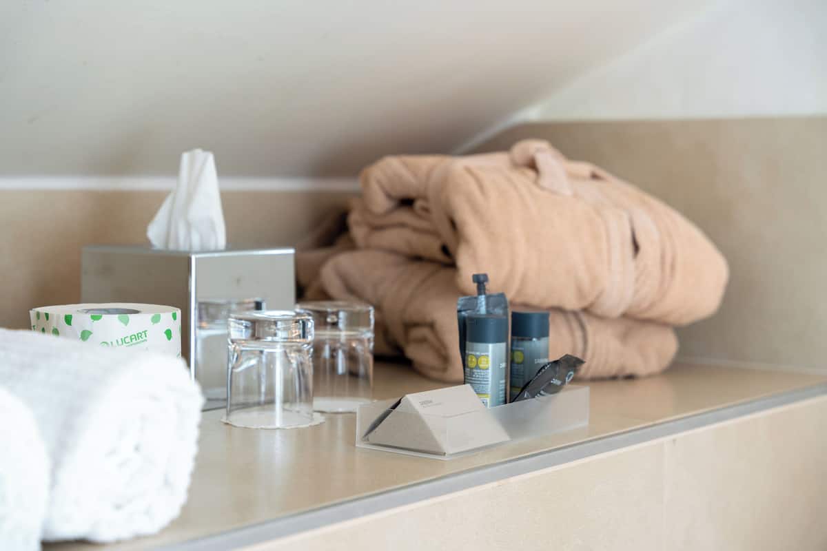 suite | bathroom | shower, rainfall showerhead, designer toiletries, hair dryer