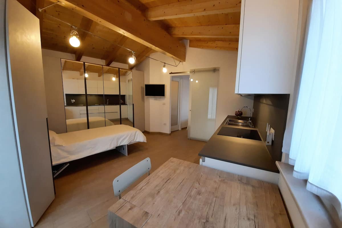 superior studio | living area | 32-inch smart tv with satellite channels, tv