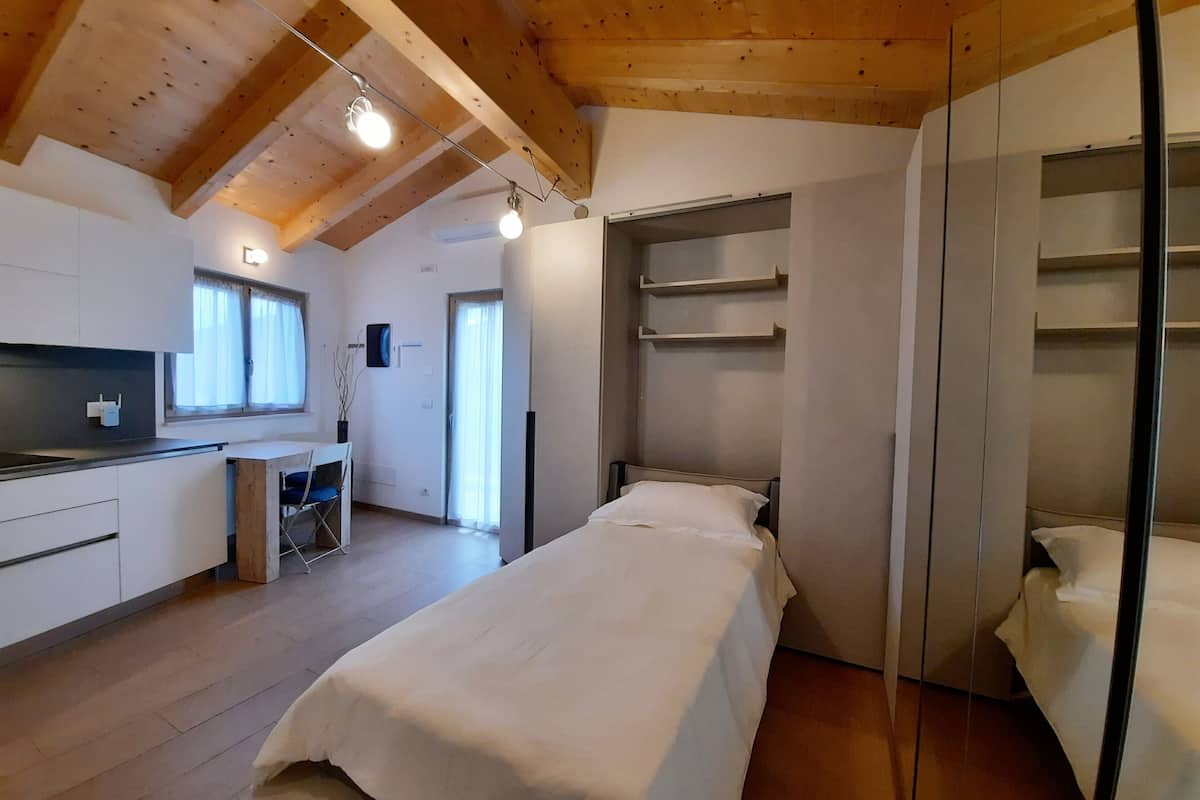 superior studio | living area | 32-inch smart tv with satellite channels, tv