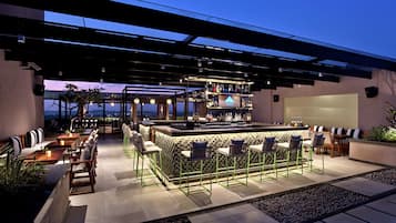 Rooftop bar, pool views, open daily