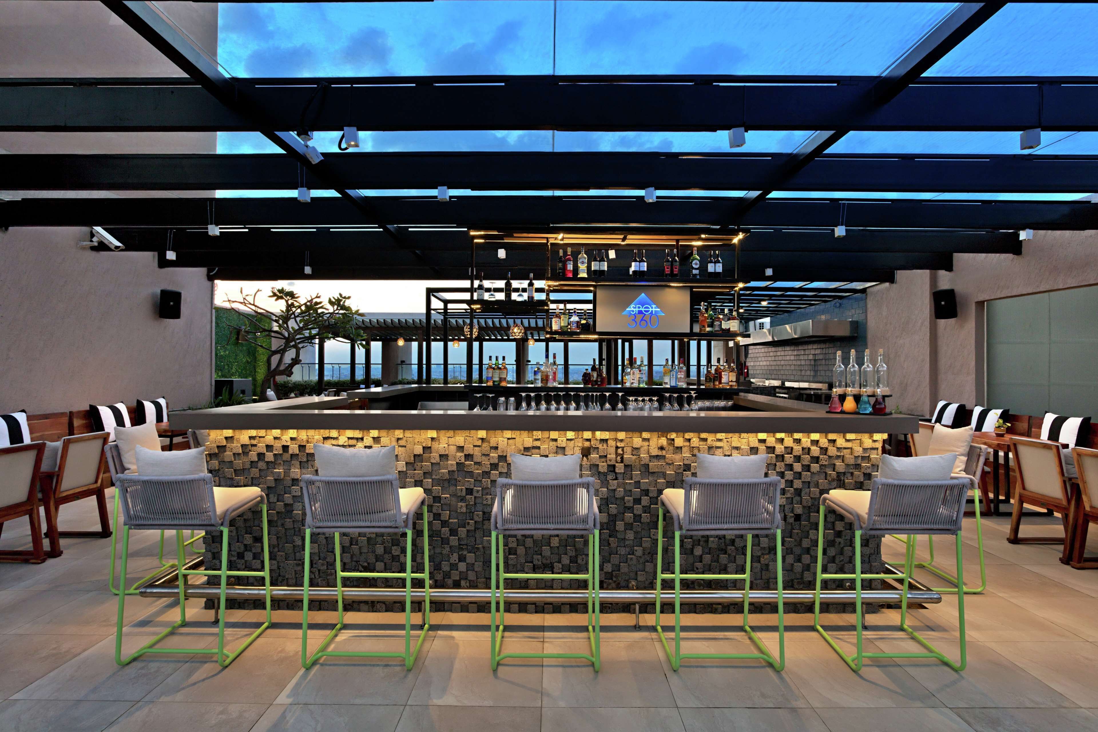 rooftop bar, poolside views, open daily