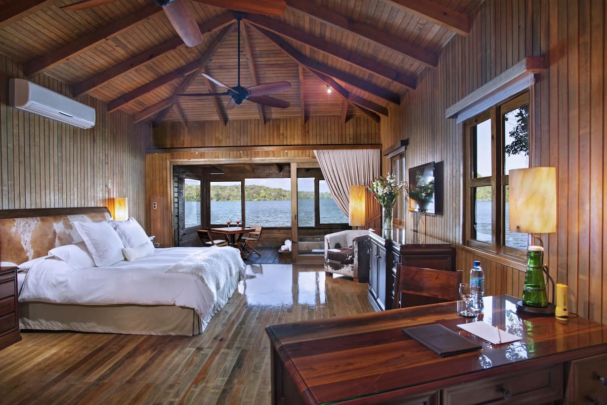 a waterfront suite single | 1 bedroom, premium bedding, down duvets, minibar