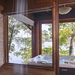 E Waterfront Master Suite Single | Bathroom | Shower, rainfall showerhead, free toiletries, hair dryer