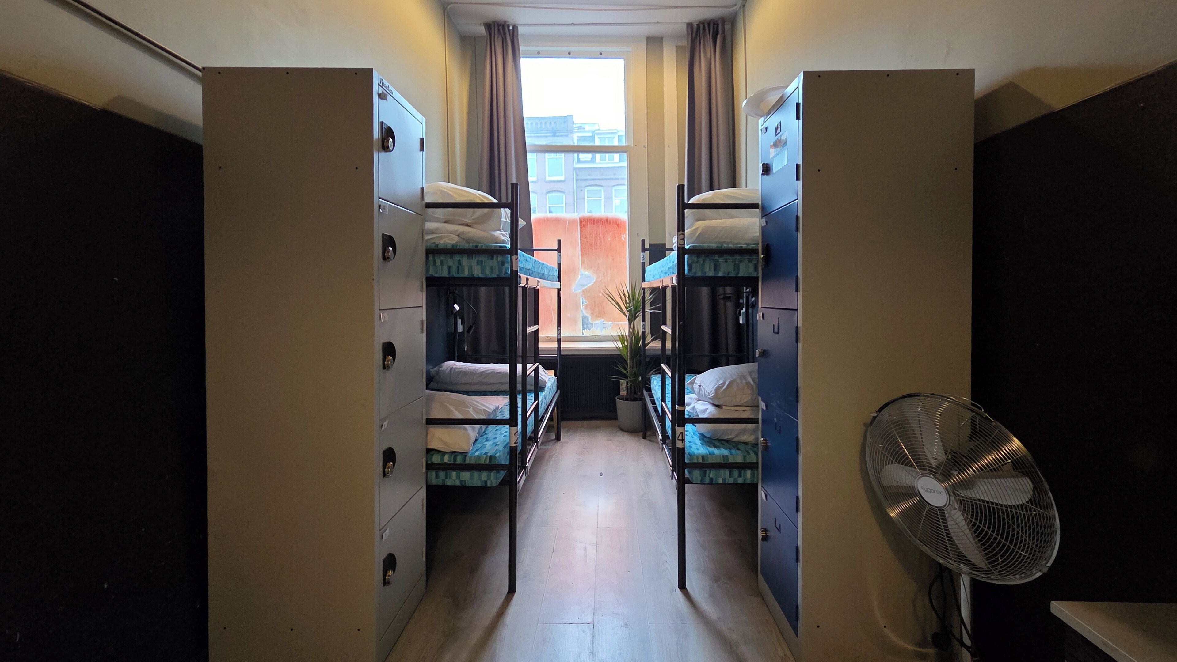 Bed in a 4-bed female dormitory with private bathroom