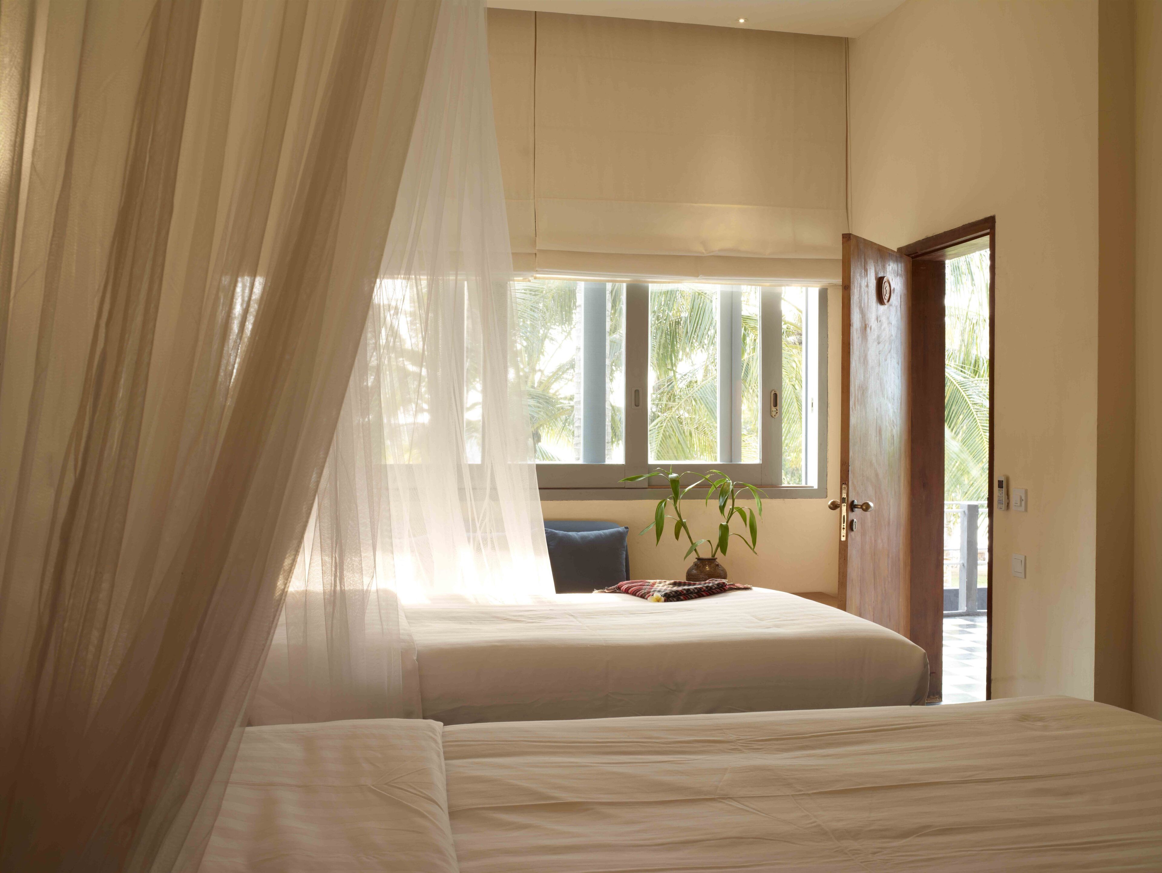 Superior Twin Room | Minibar, in-room safe, desk, laptop workspace