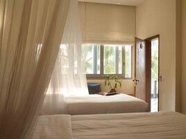 Superior Twin Room | Minibar, in-room safe, desk, laptop workspace