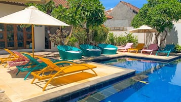 Outdoor pool, pool umbrellas, pool loungers