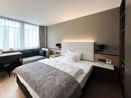 Habitación Confort (Queen Size) | Caja fuerte, cortinas opacas, sistema de insonorización