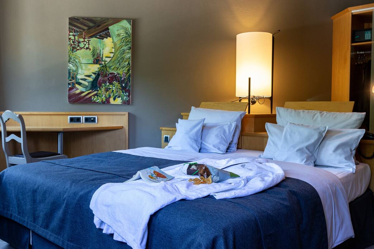 comfort room (king size) | in-room safe, blackout curtains, soundproofing, iron/ironing board