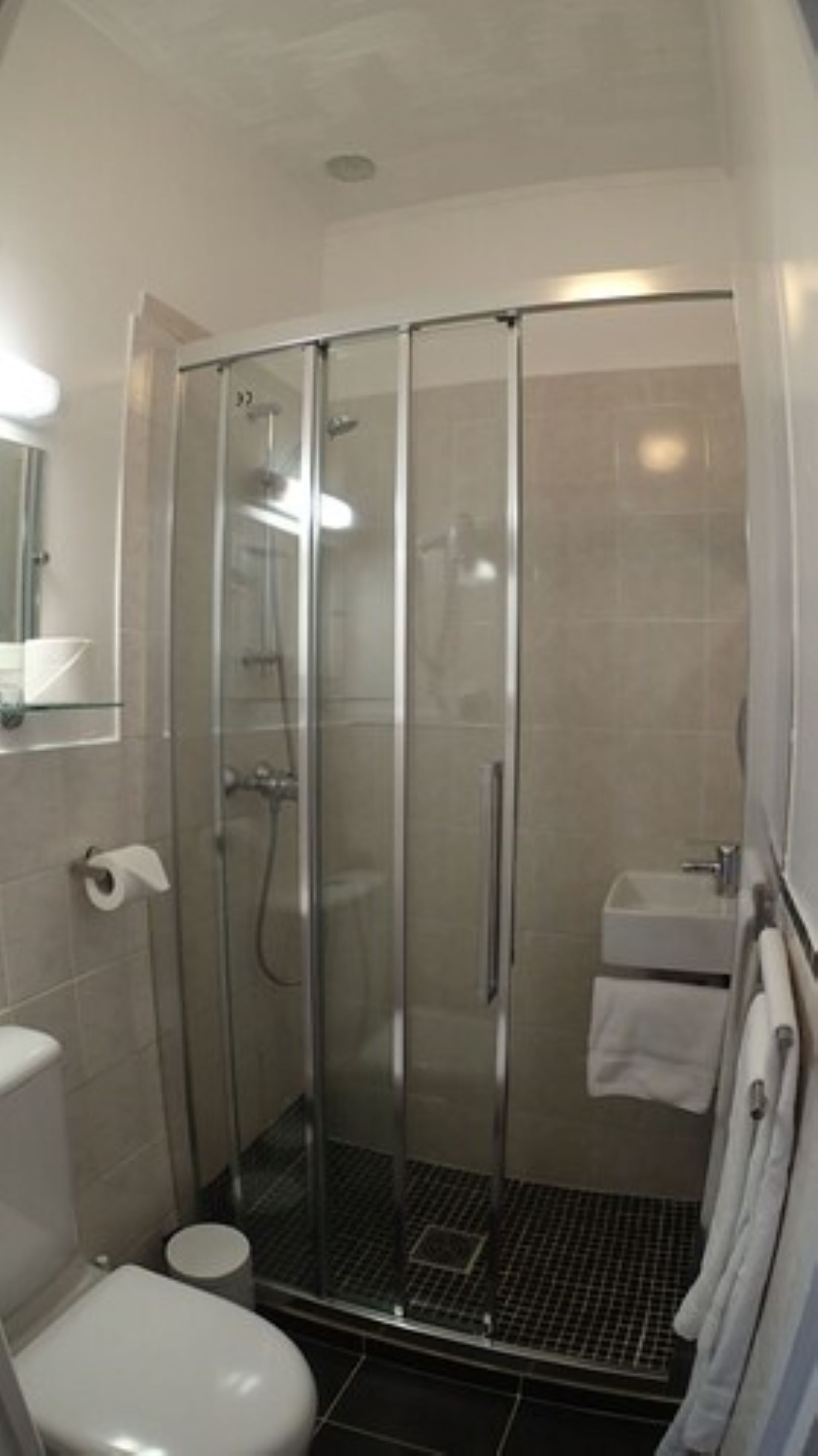 economy single room, 1 large single bed | bathroom | eco-friendly toiletries, hair dryer, towels