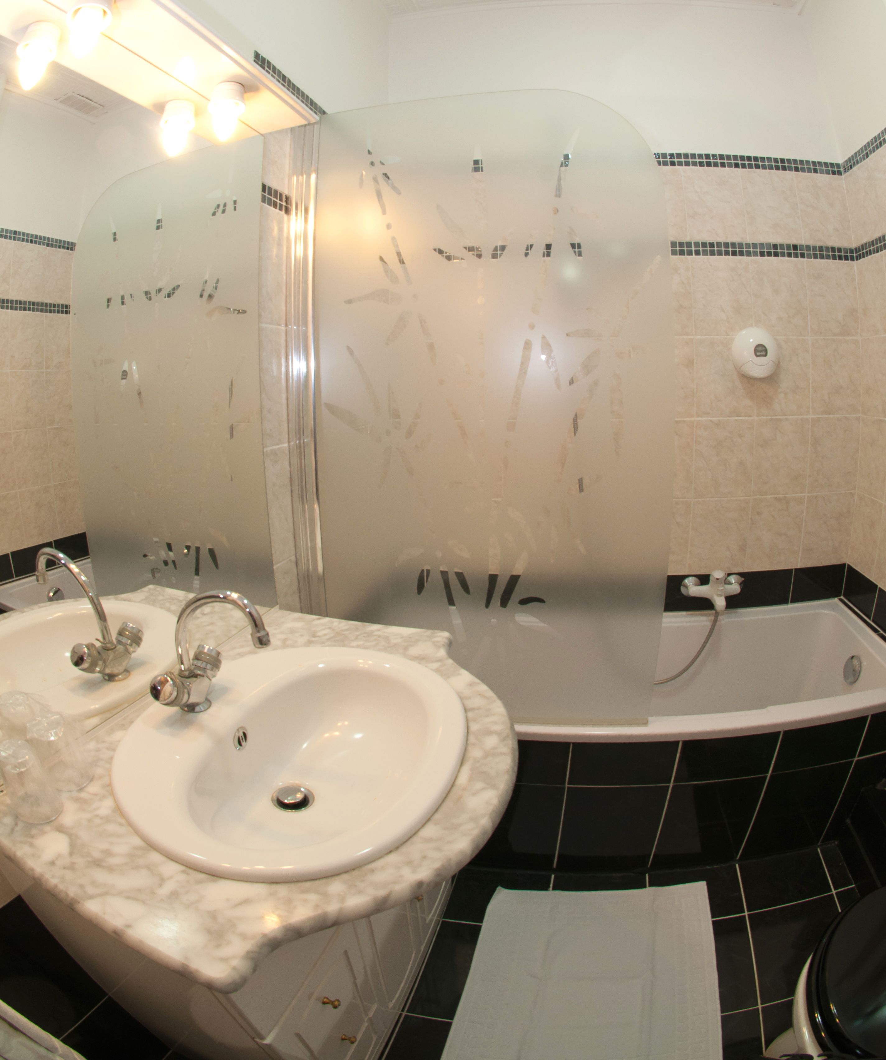 standard double room | bathroom | eco-friendly toiletries, hair dryer, towels