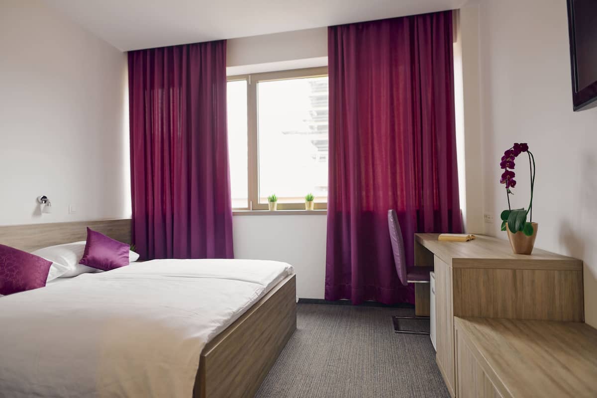 Comfort-Doppel- oder -Zweibettzimmer
