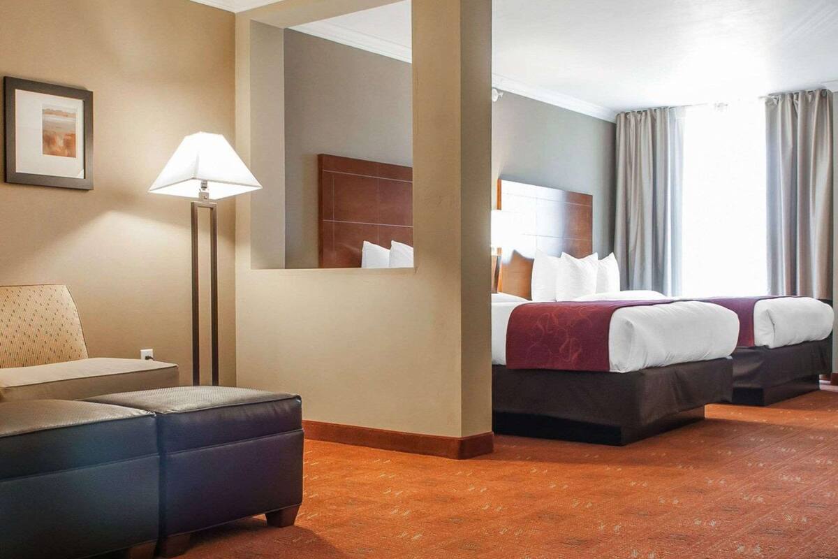 premium bedding, pillow-top beds, desk, laptop workspace