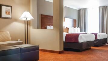 Premium bedding, pillow-top beds, desk, laptop workspace