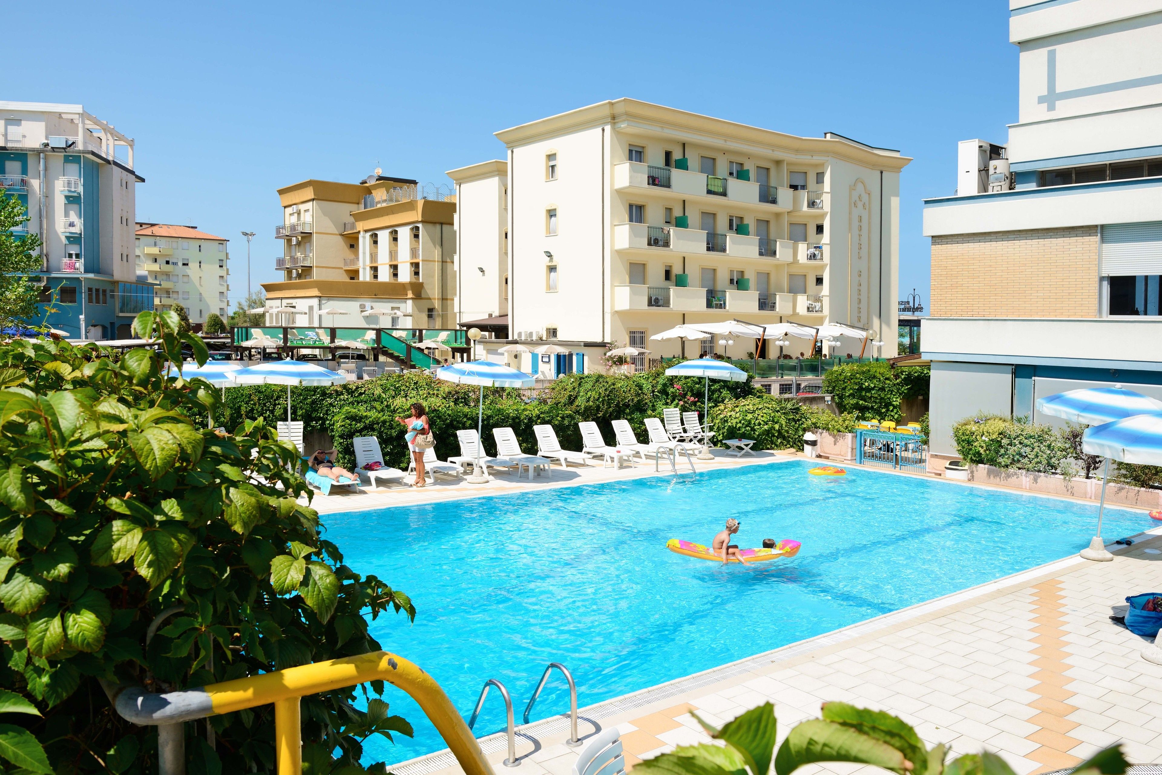 outdoor pool, open 7:00 am to 7:00 pm, pool loungers