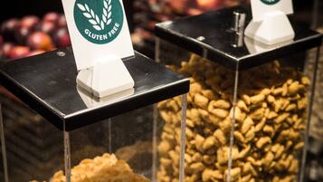 Two glass display cases with labels indicating gluten-free products.