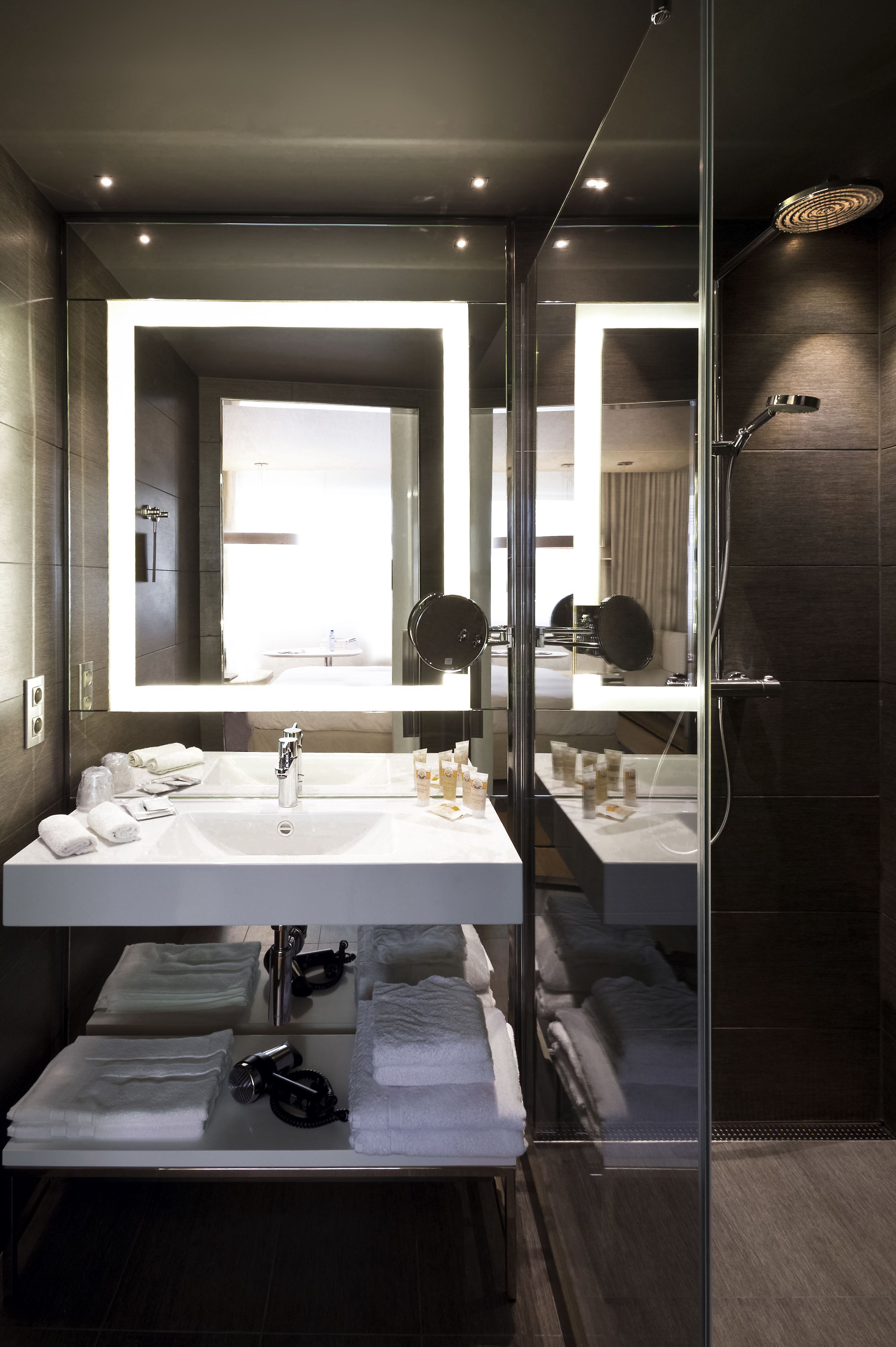 deep-soaking bathtub, rainfall showerhead, eco-friendly toiletries