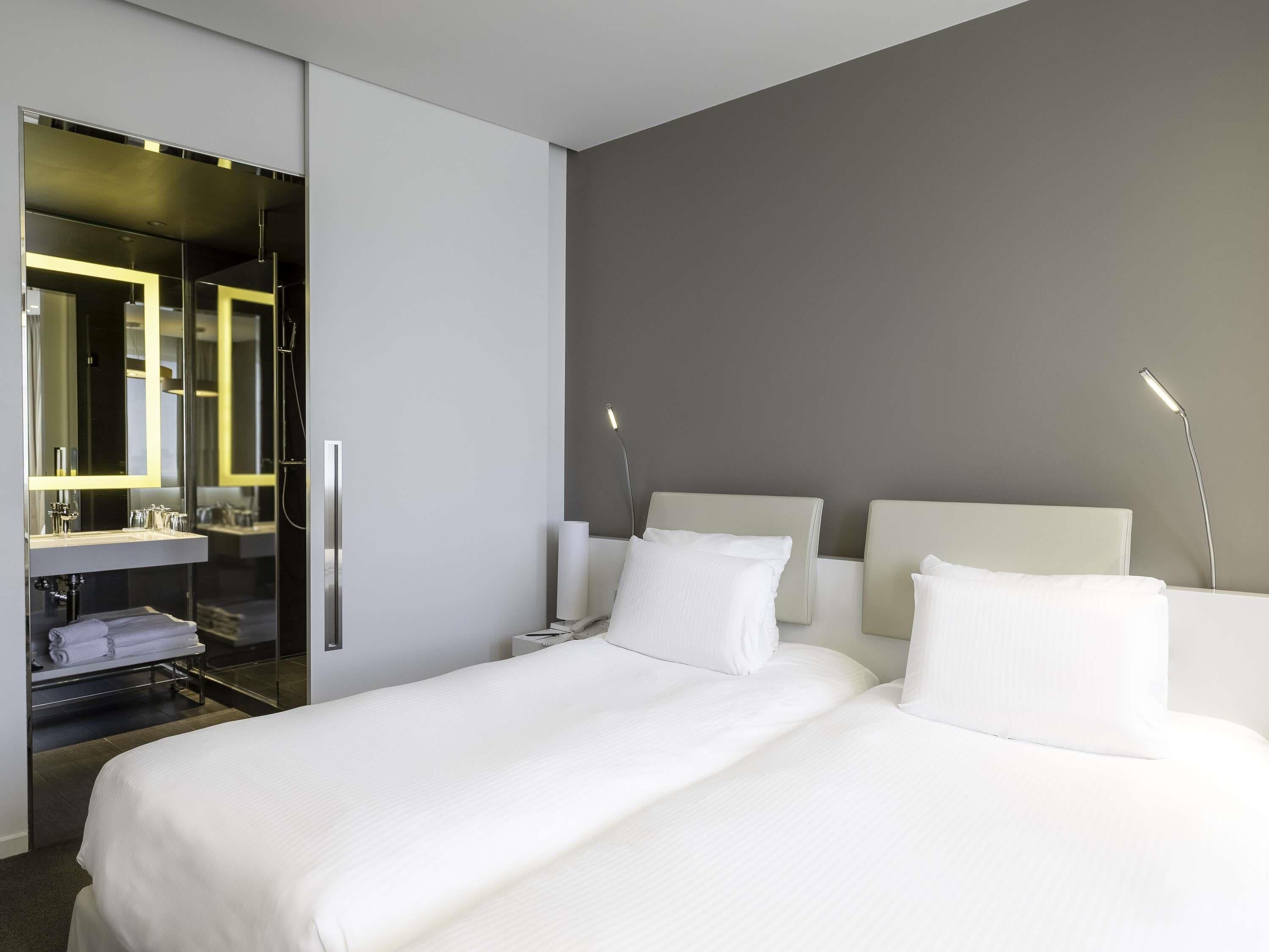 Habitación clásica, 2 camas individuales | Artículos del minibar gratis y caja de seguridad en la habitación 