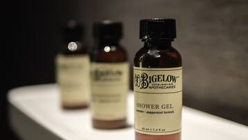 Three bottles of Bigelow shower gel on a white surface.