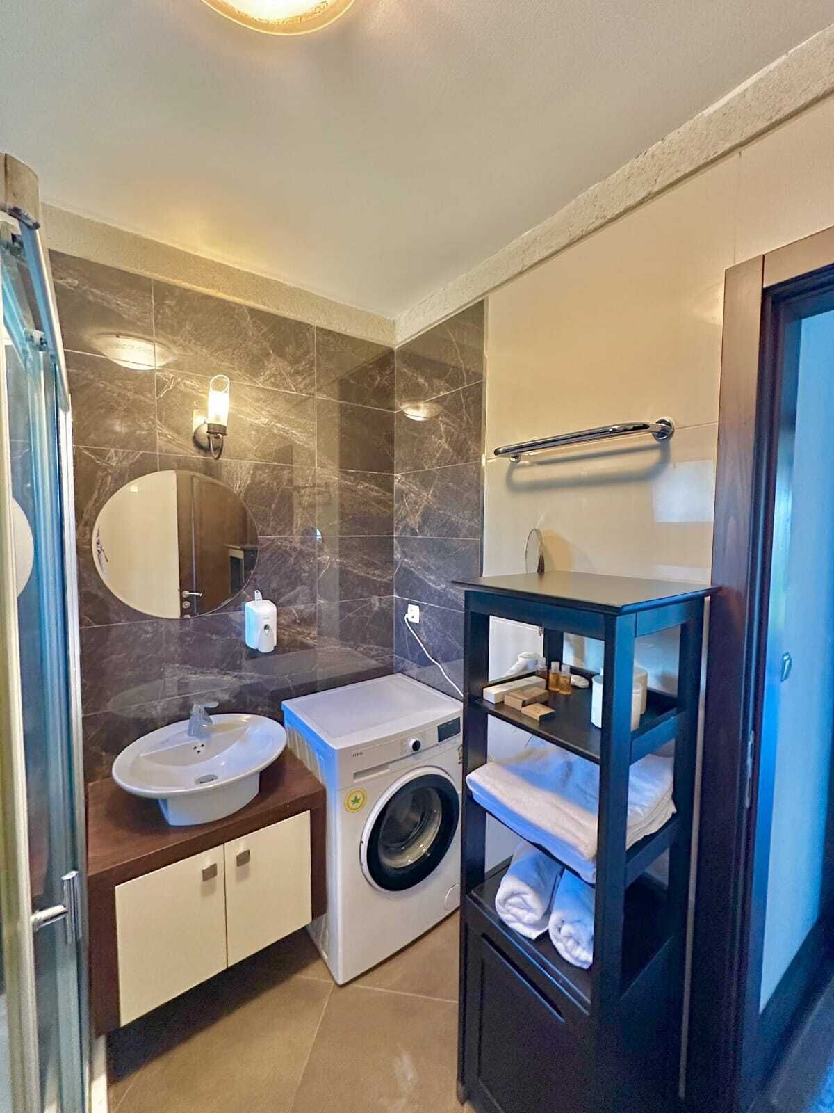 superior villa, pool view | bathroom | shower, hair dryer, slippers, towels