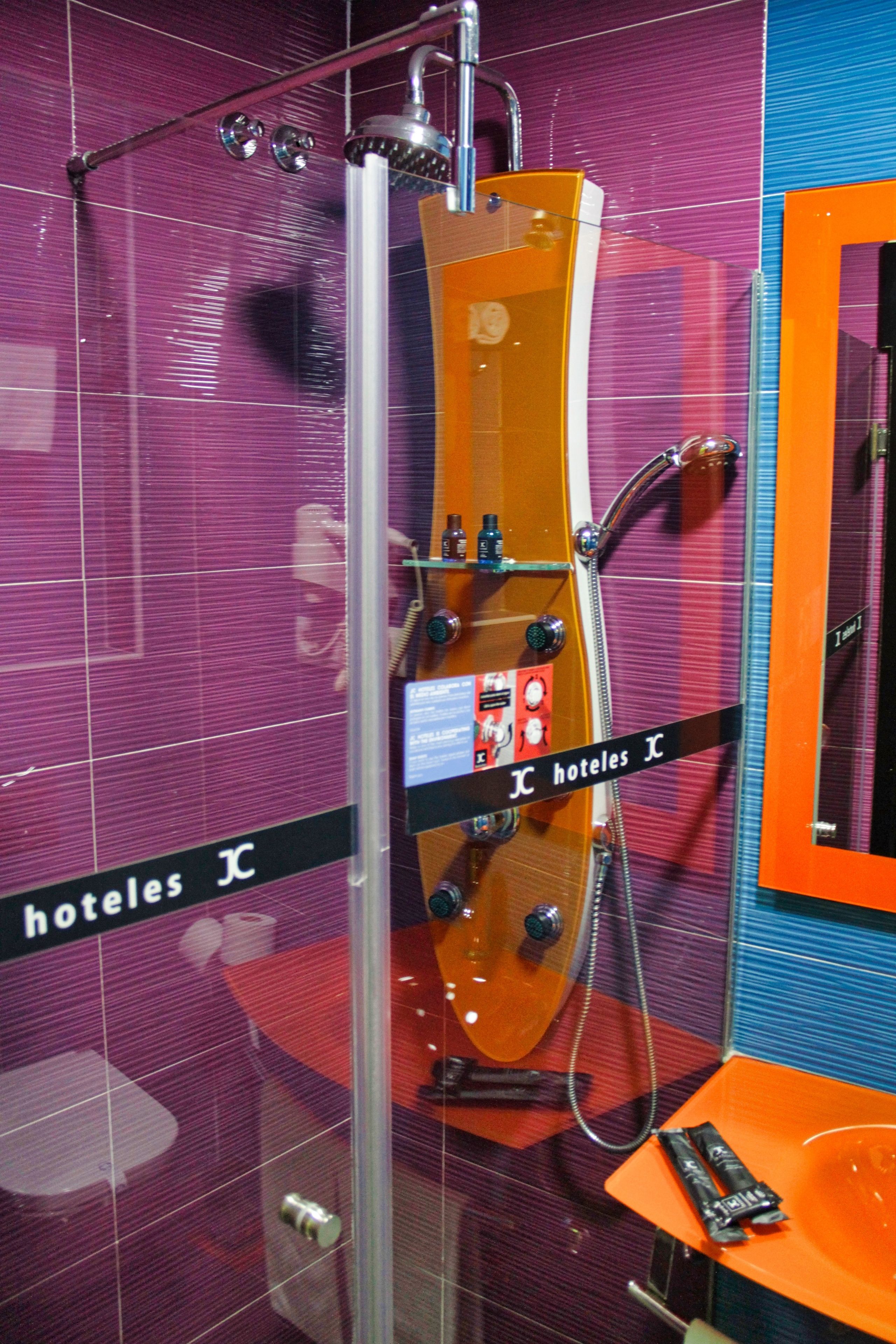 family room | bathroom | shower, hydromassage showerhead, free toiletries, hair dryer