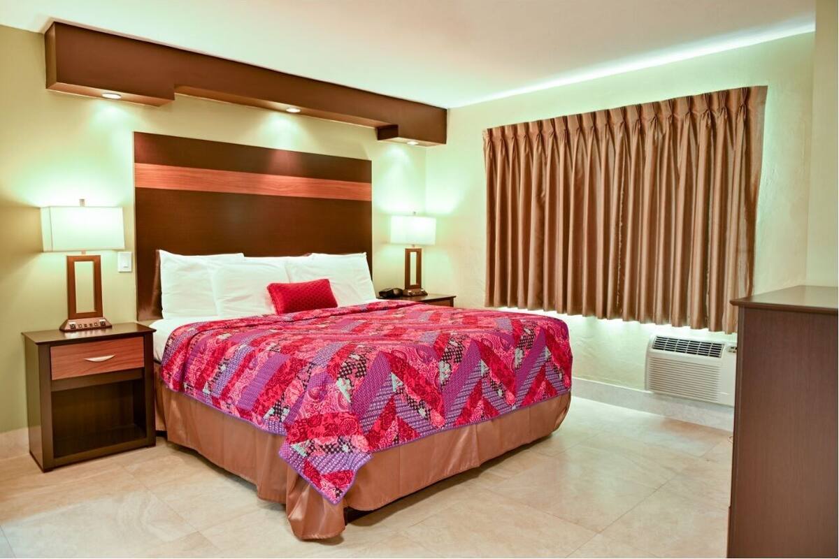 Premium bedding, blackout drapes, iron/ironing board, WiFi (free)