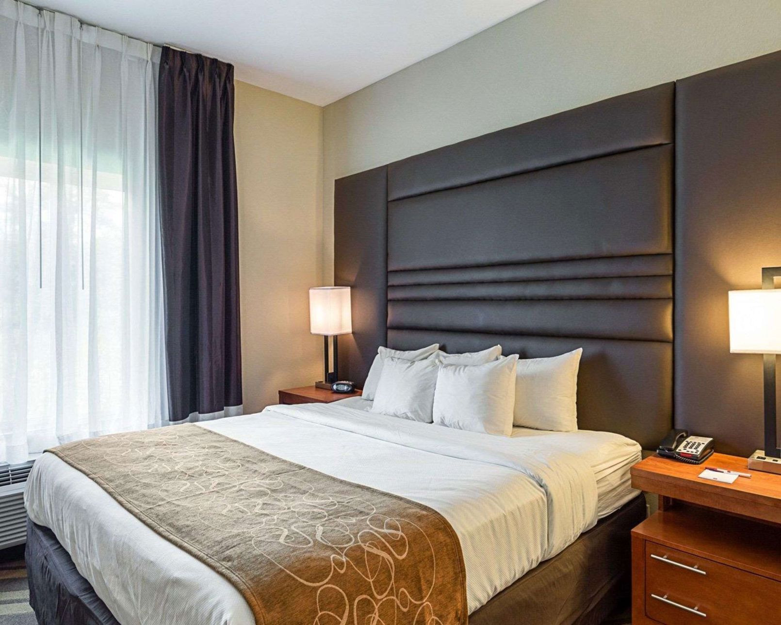 Premium bedding, desk, blackout drapes, iron/ironing board