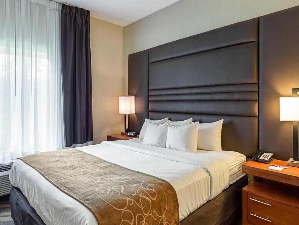 Premium bedding, desk, blackout drapes, iron/ironing board