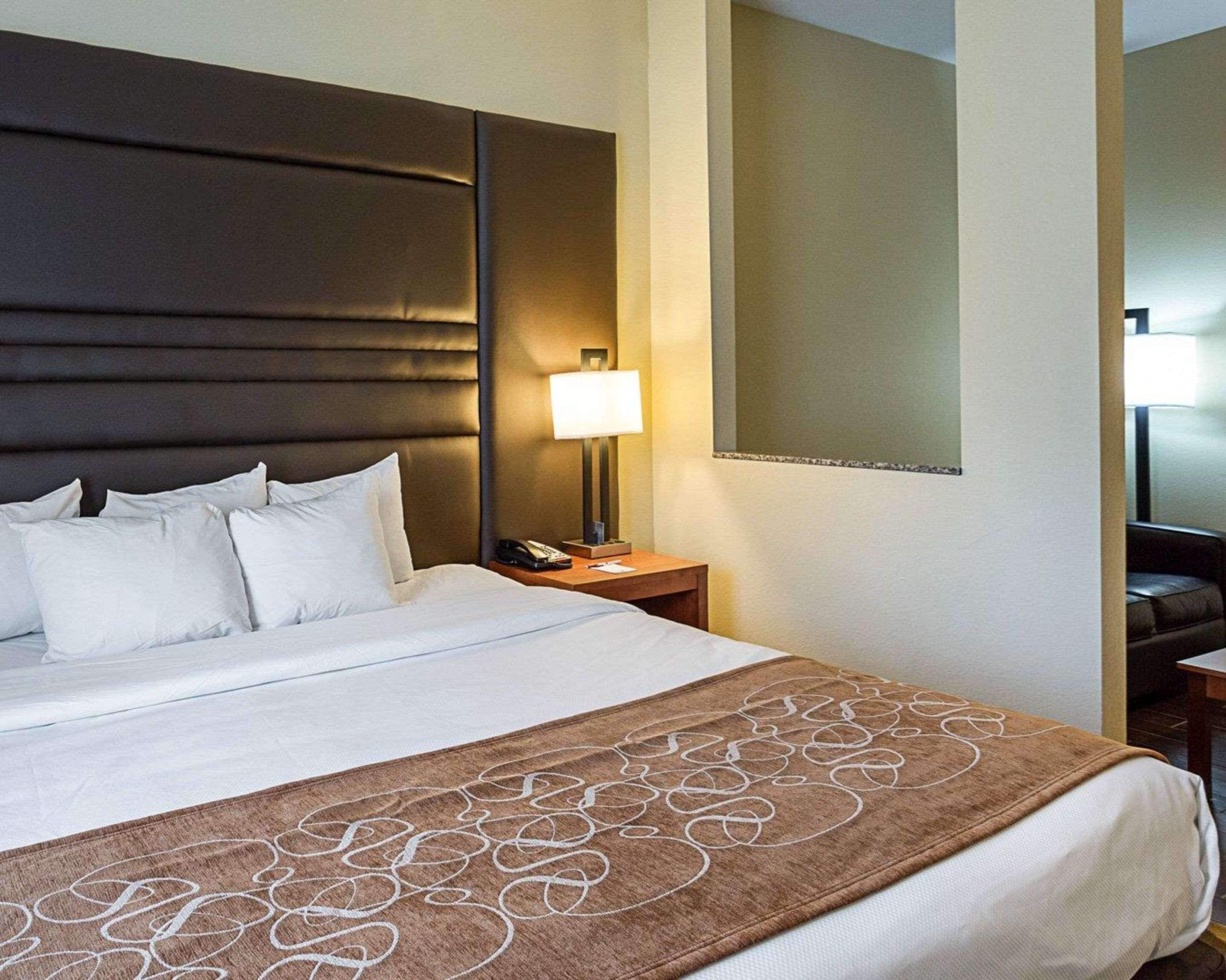 premium bedding, desk, blackout curtains, iron/ironing board