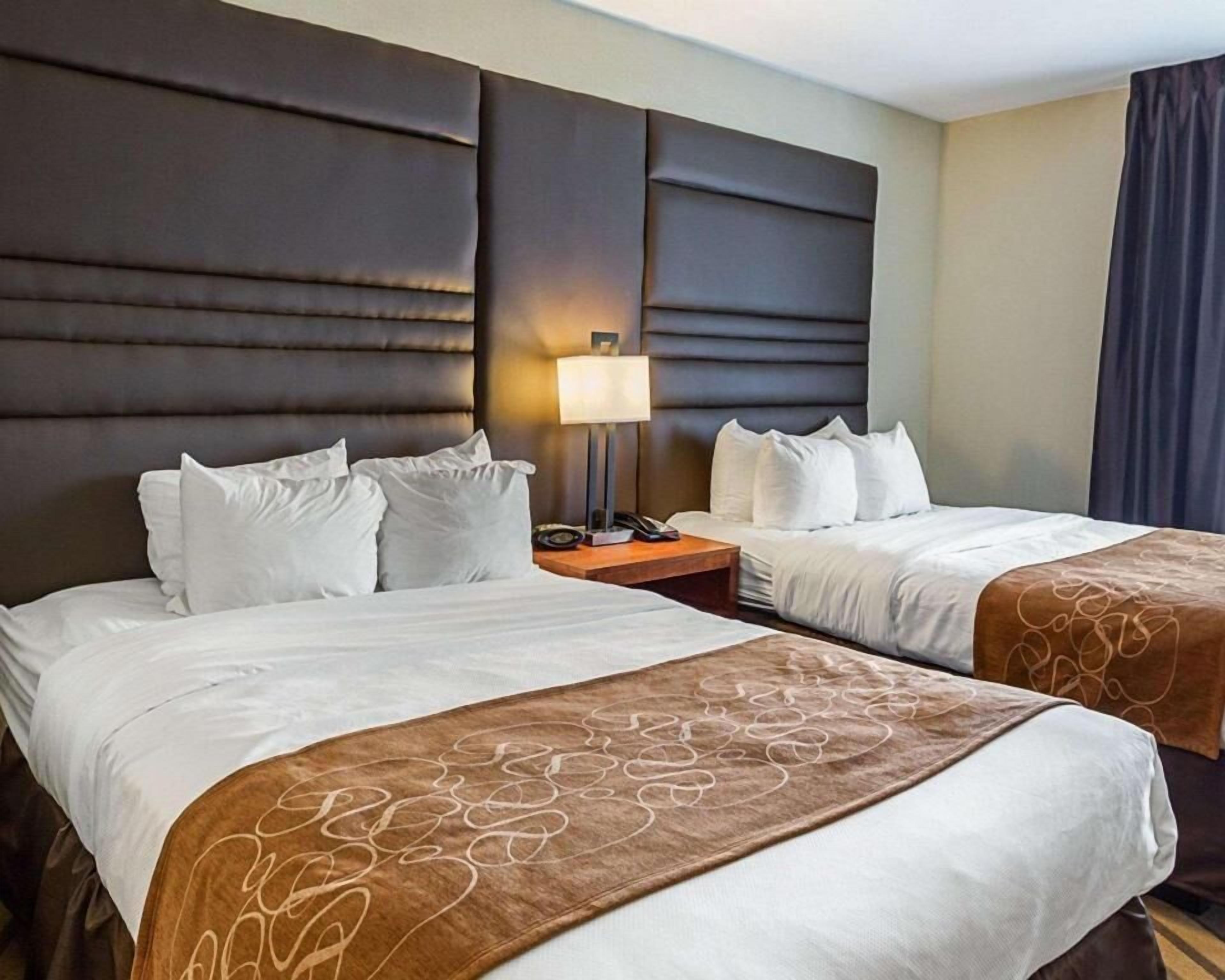 Premium bedding, desk, blackout drapes, iron/ironing board